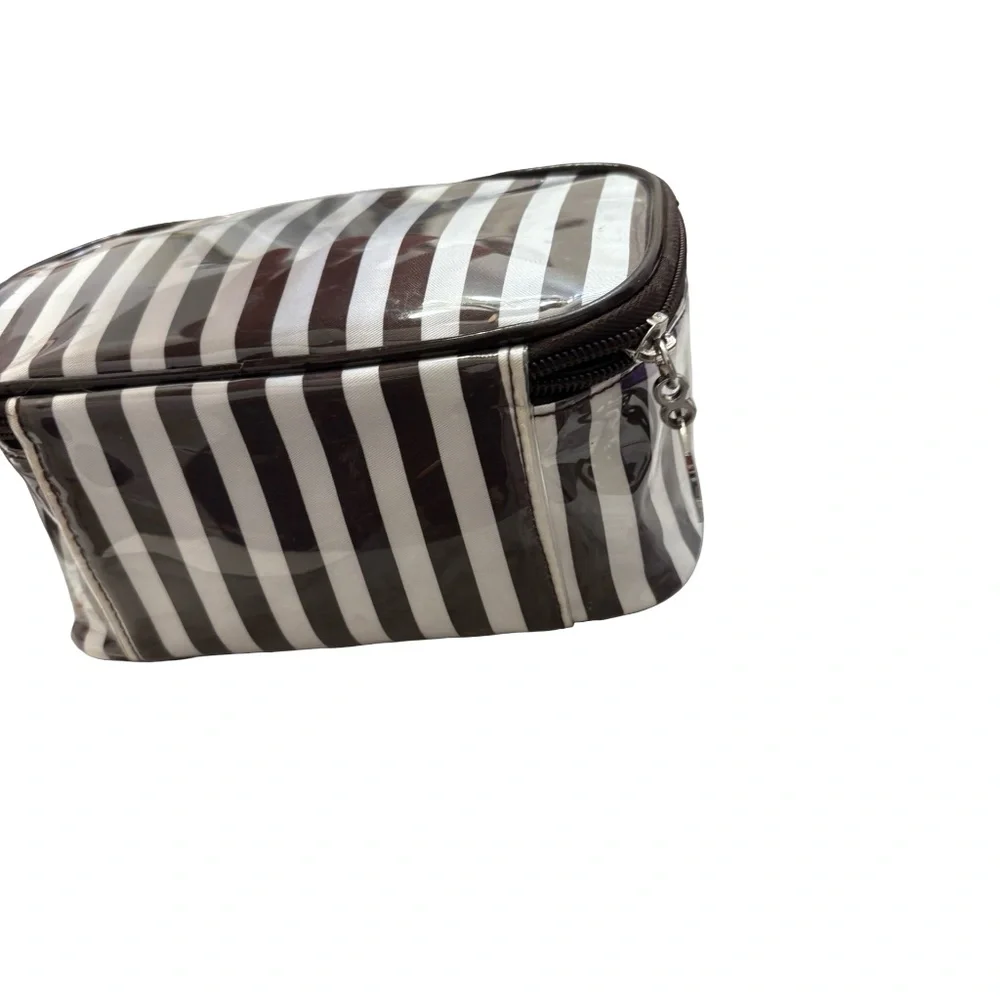 Henri bendel white & brown striped cosmeti case bag.